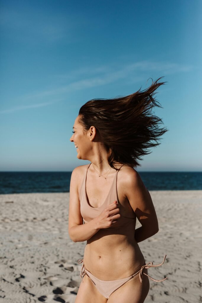 A woman in beige bikini