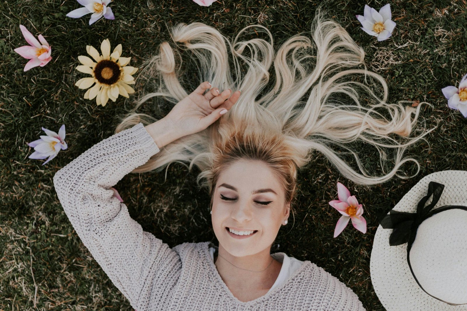 Woman lying on flowers