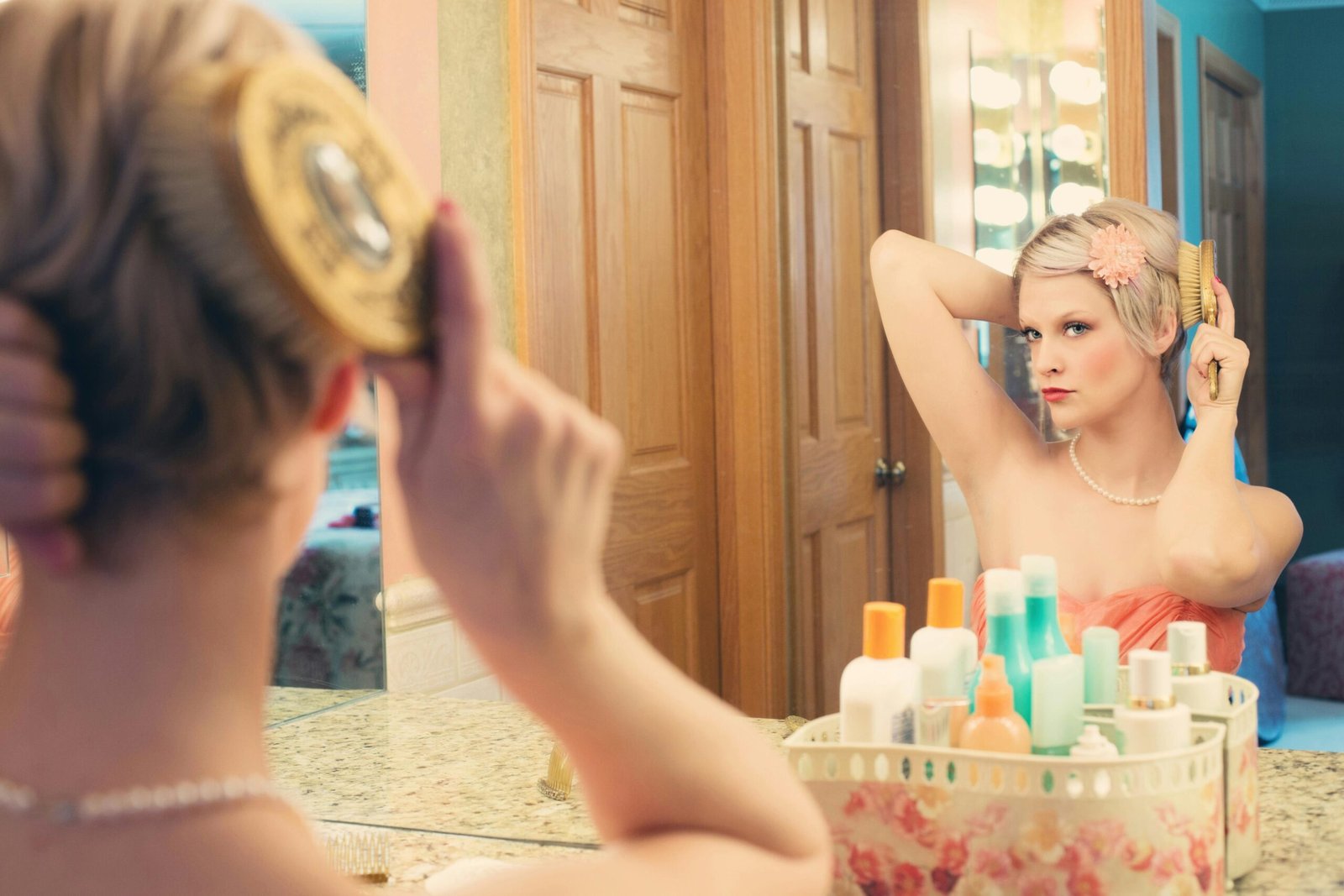 Woman using hair brush