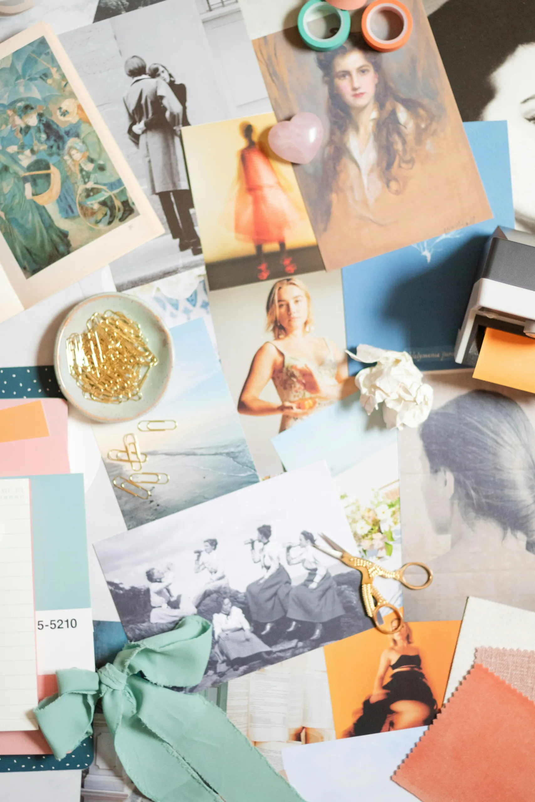 A flatlay of mood board images and materials.